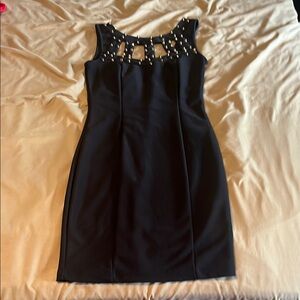 Elegant Black Sleeveless Dress with Studded Detail